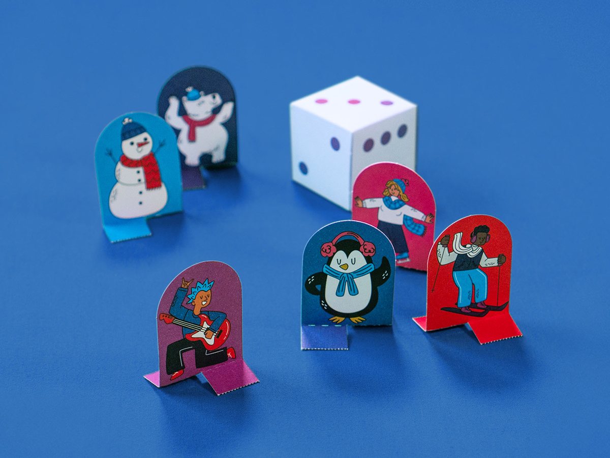 Spielfiguren und Würfel aus Papier